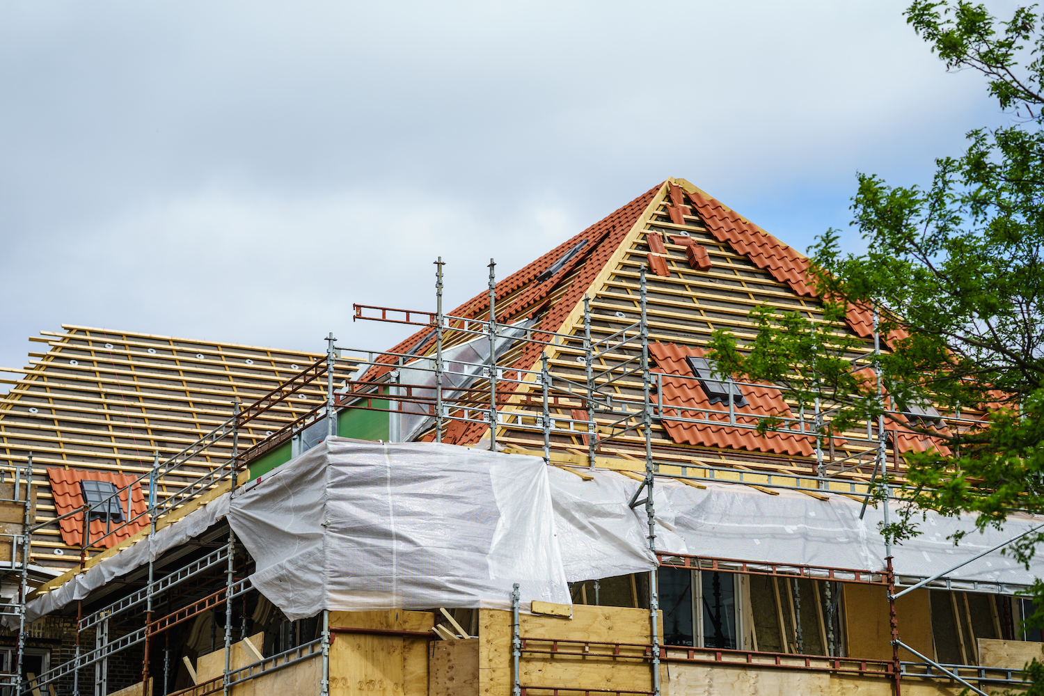 Roof Work on going top of building with exterior roof window